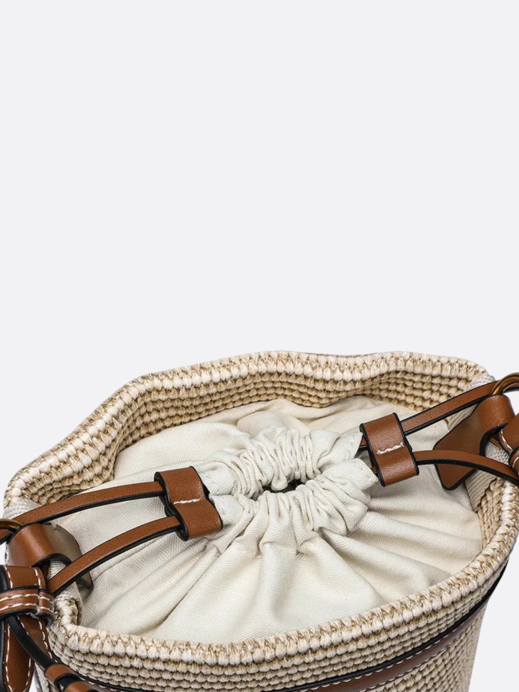 Bucket bag in raffia and leather trim